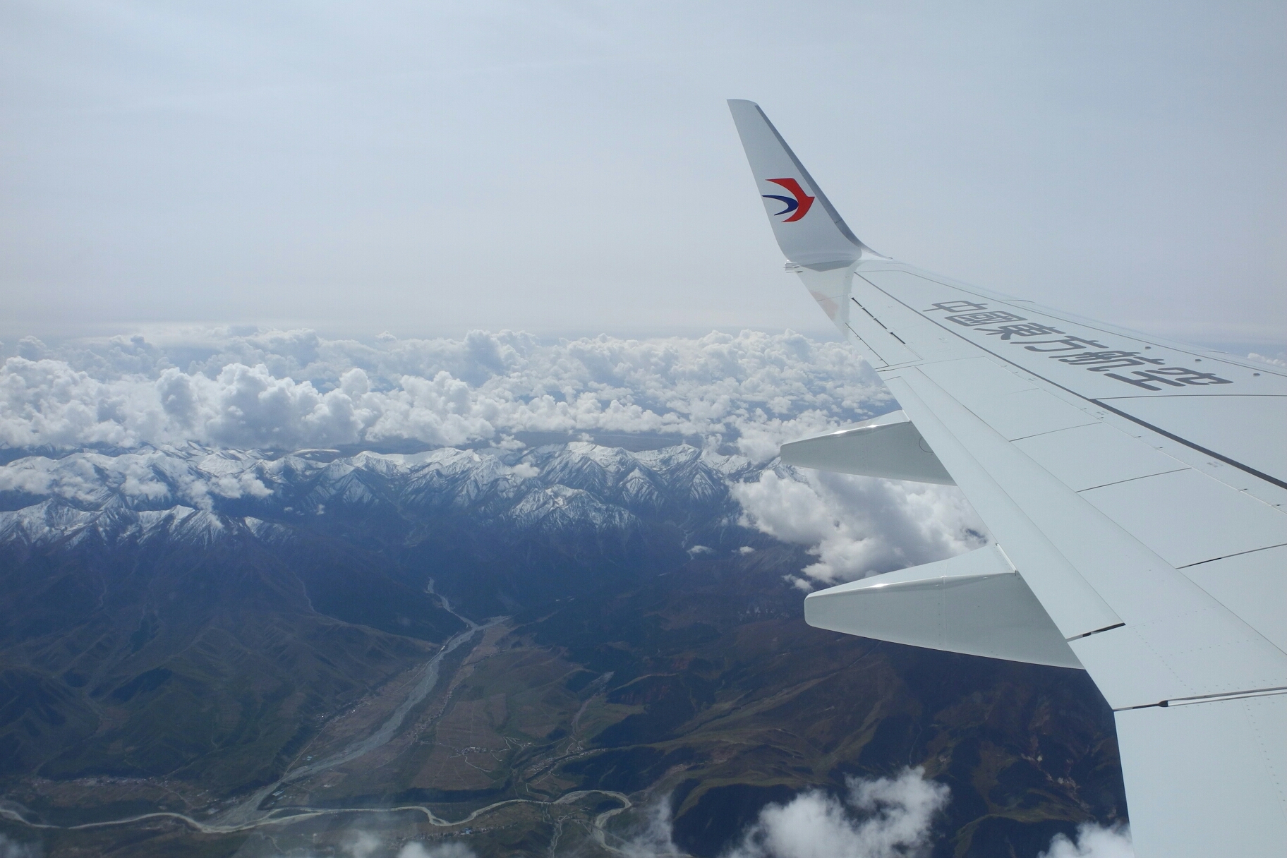 广西到乌鲁木齐怎么搭飞机_乌鲁木齐航空飞机图片